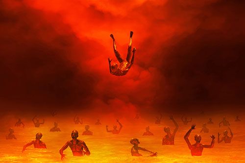 A depiction of tormented souls wading in a lake of fire in Hell.