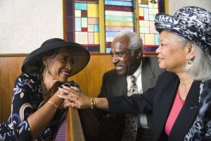 A group of churchgoers having a conversation