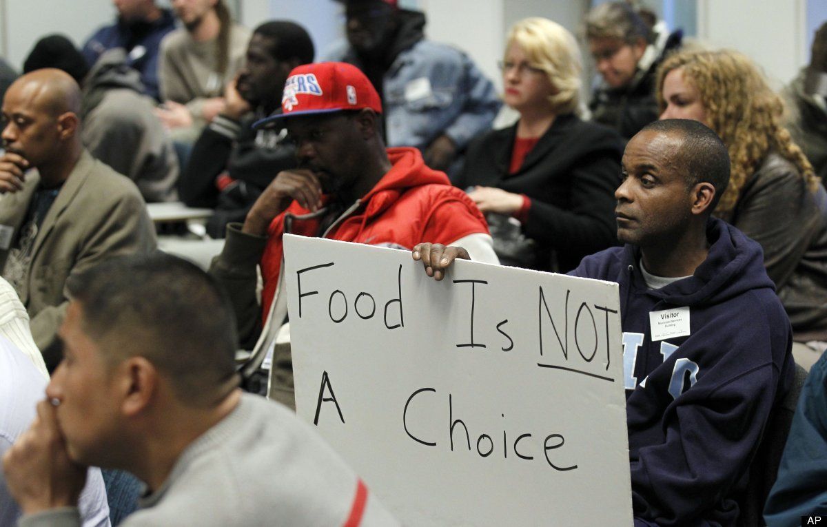 People protesting a ban on feeding homeless