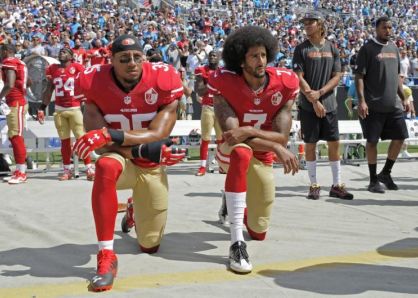 Colin Kaepernick kneeling during national anthem