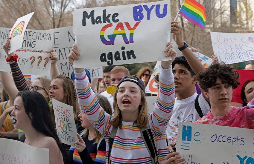 Student Holds Up Sign That Says 'Make BYU Gay Again'