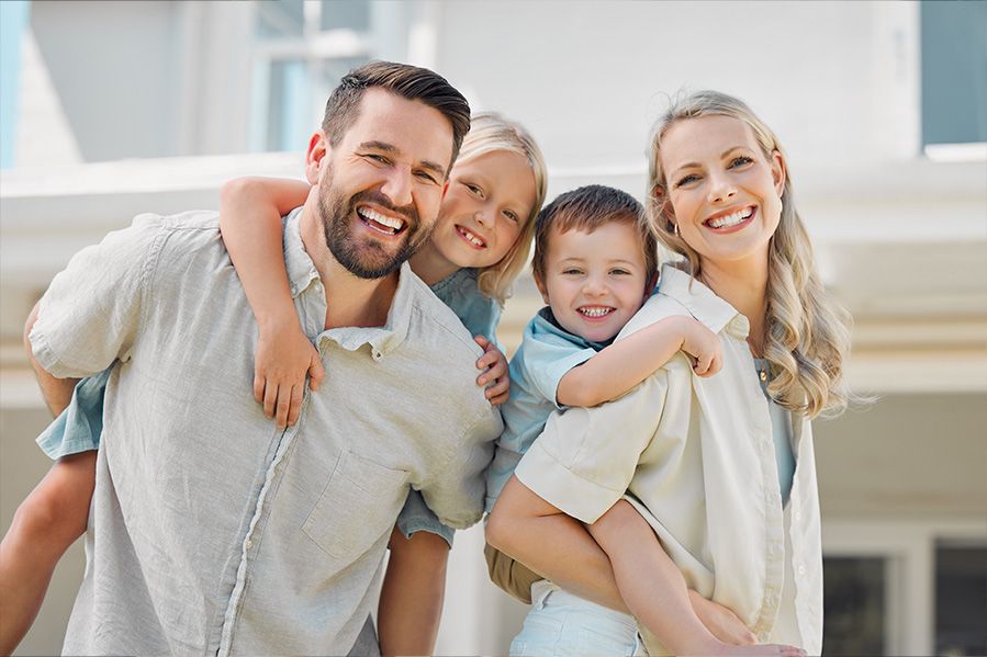 smiling traditional nuclear family
