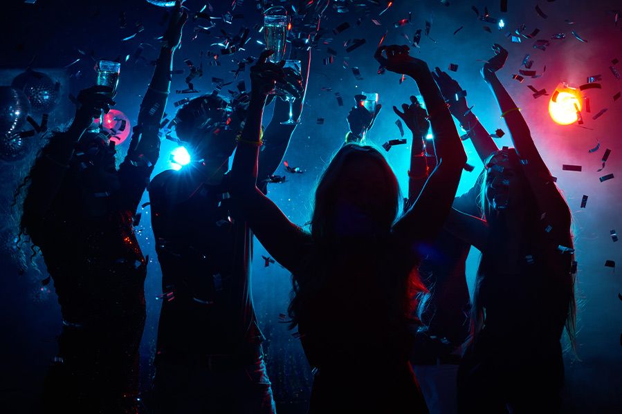 nightclub partygoers dancing in club