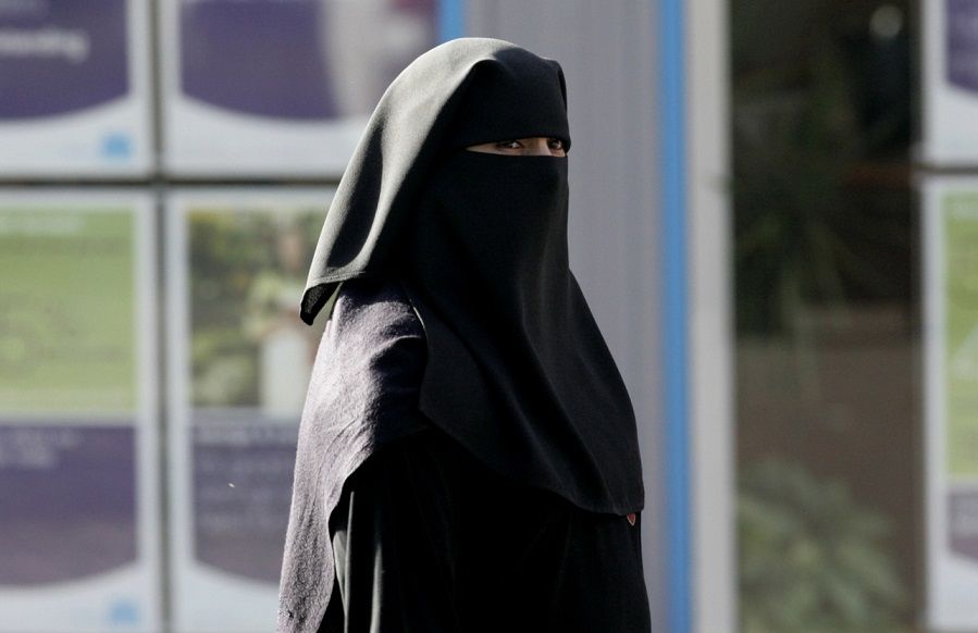 Woman wearing niqab. 