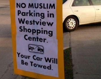 A sign that says no Muslim parking