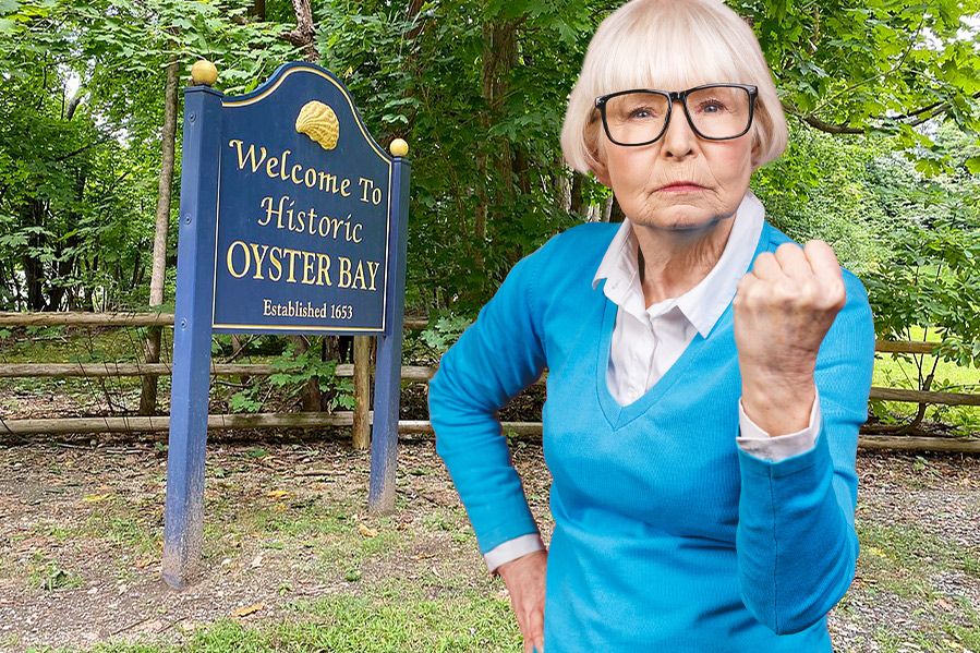 angry grandmother in front of welcome to oyster bay sign