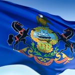 Pennsylvania state flag flapping on breeze