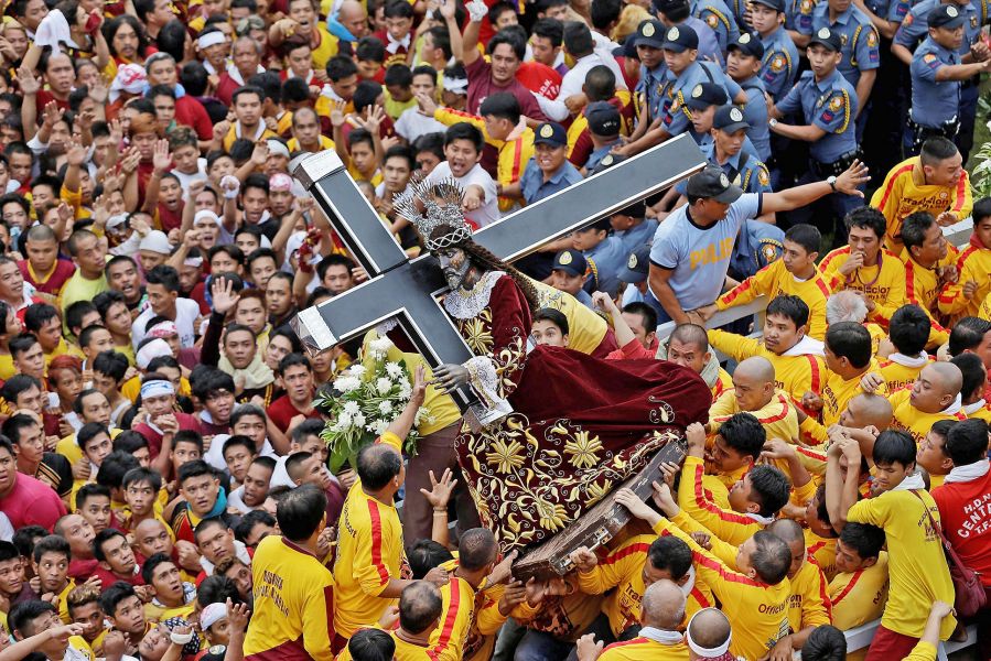 Filipino Catholics during the an annual religious procession