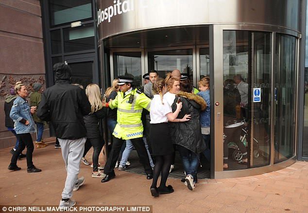 U.K. Police block a hospital entrance
