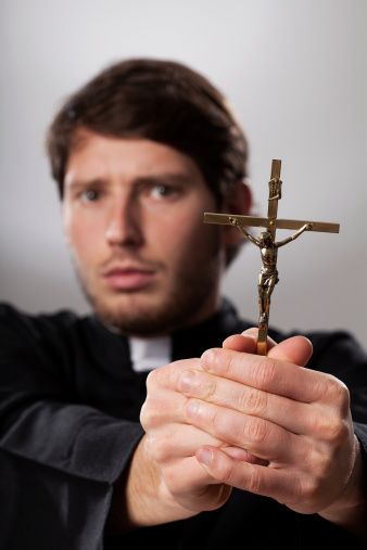 priest cross