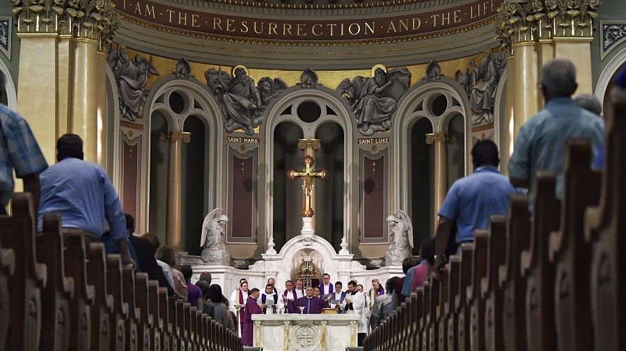 Catholic priests gathering for prayer