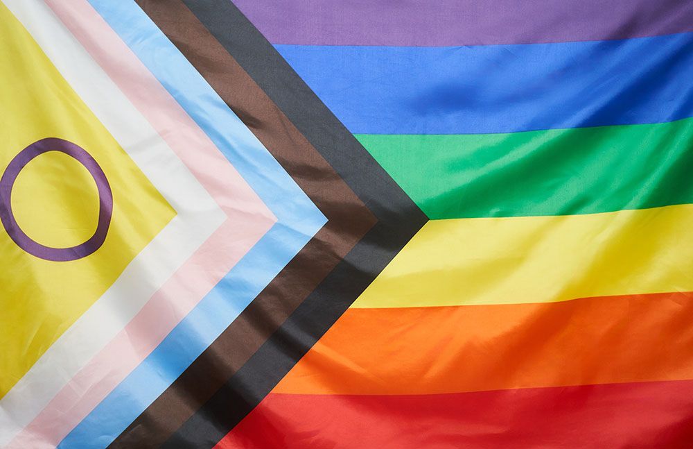 A close-up photo of the progress pride flag