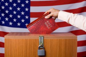 Man putting Holy Bible in United States ballot box