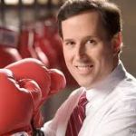 Rick Santorum wearing boxing gloves