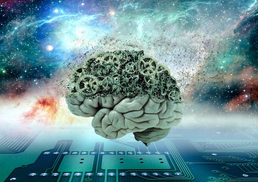 A robotic human brain hovering over a computer