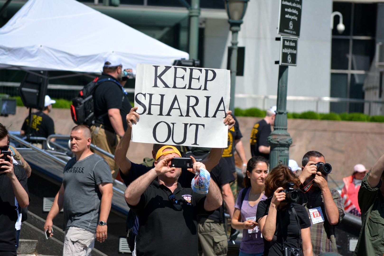 Demonstrators carrying signs at an anti-Sharia rally in Manhattan.