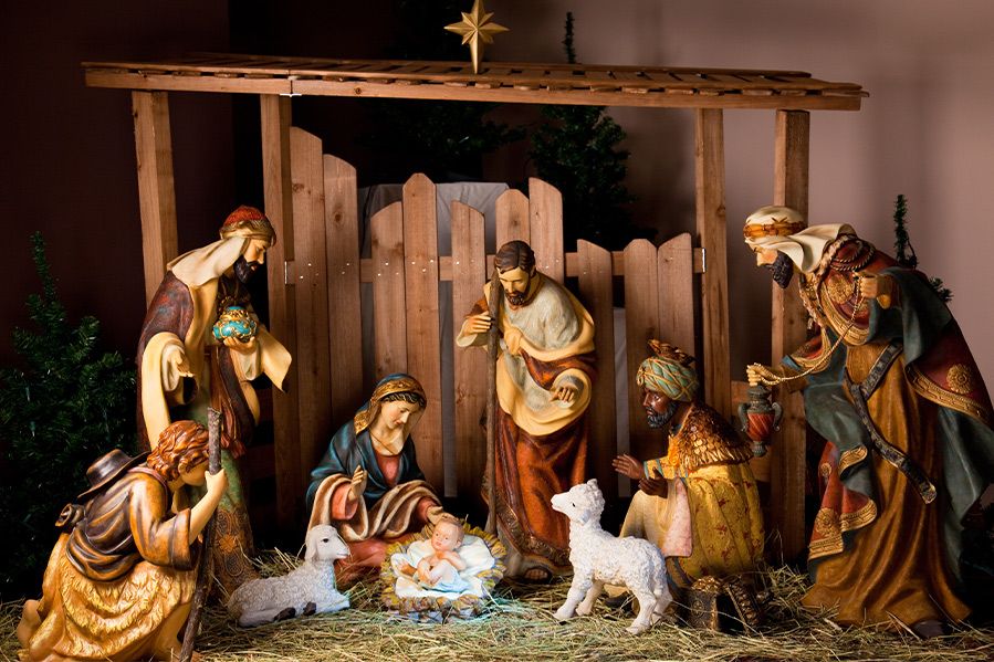 small toy nativity scene featuring jesus, mary, and joseph