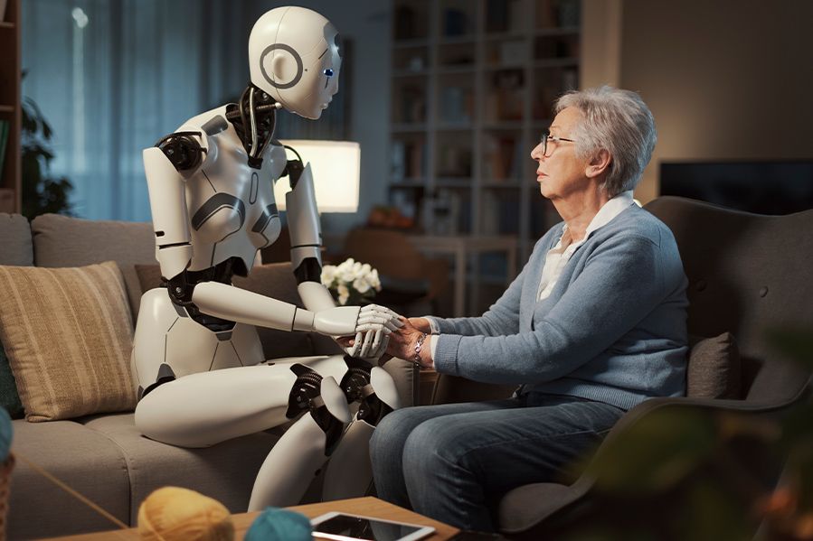 elderly woman holding hands with AI robot