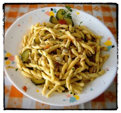 A dish of Strozzapreti pasta