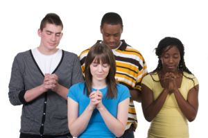 group of people praying during moment of silence