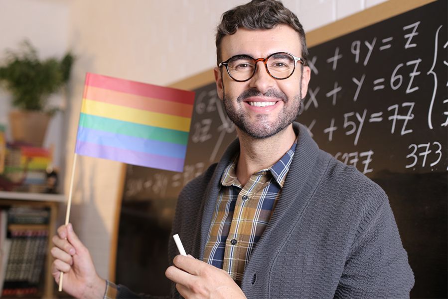 teacher in classroom supporting lgbt pride