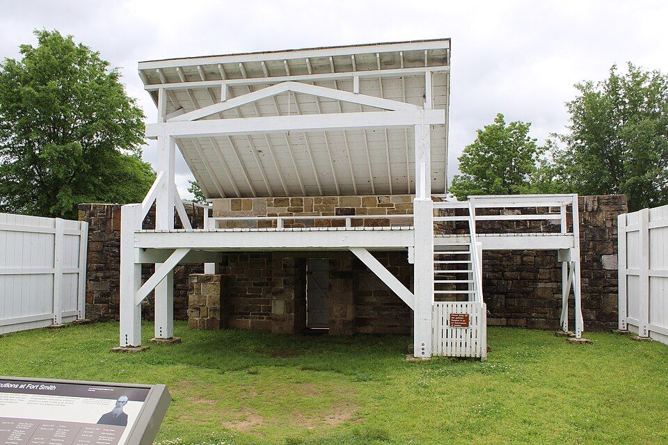 Wooden gallows with hanging ropes at the reconstructed execution site in Fort Smith, Arkansas.