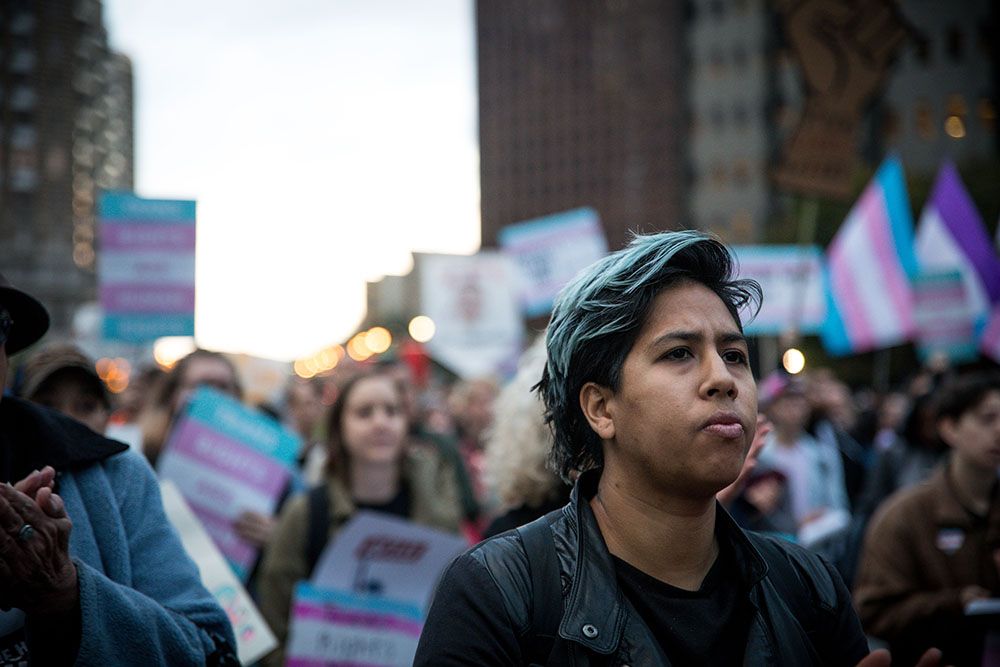 A group of young people march in support of transgender rights.