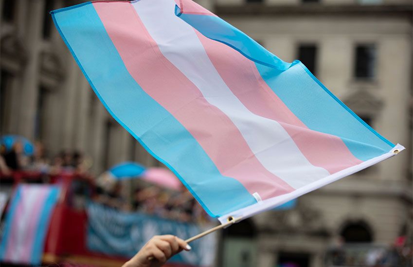 Transgender Flag Waving at Pride Parade