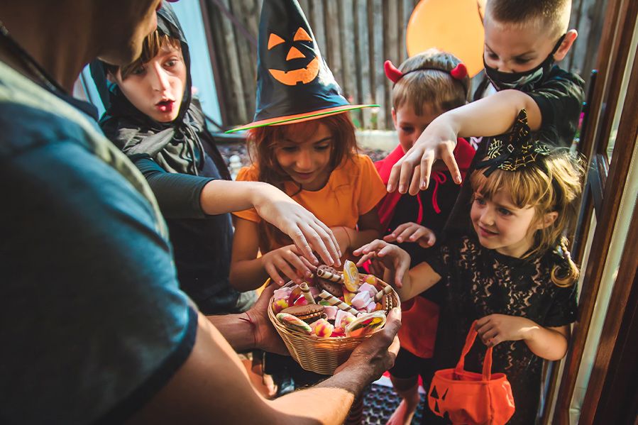 children trick or treating on halloween