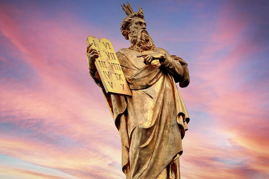statue of moses holding ten commandments