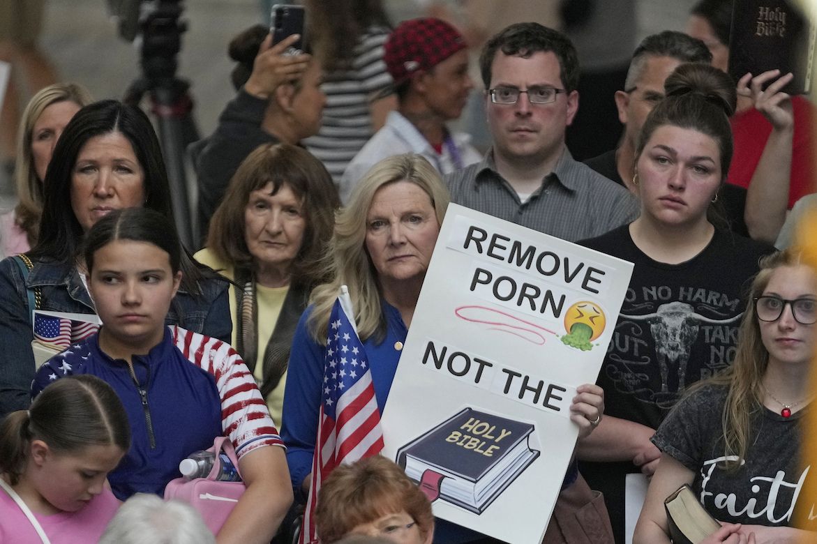 People protesting the removal of the bible from Utah schools