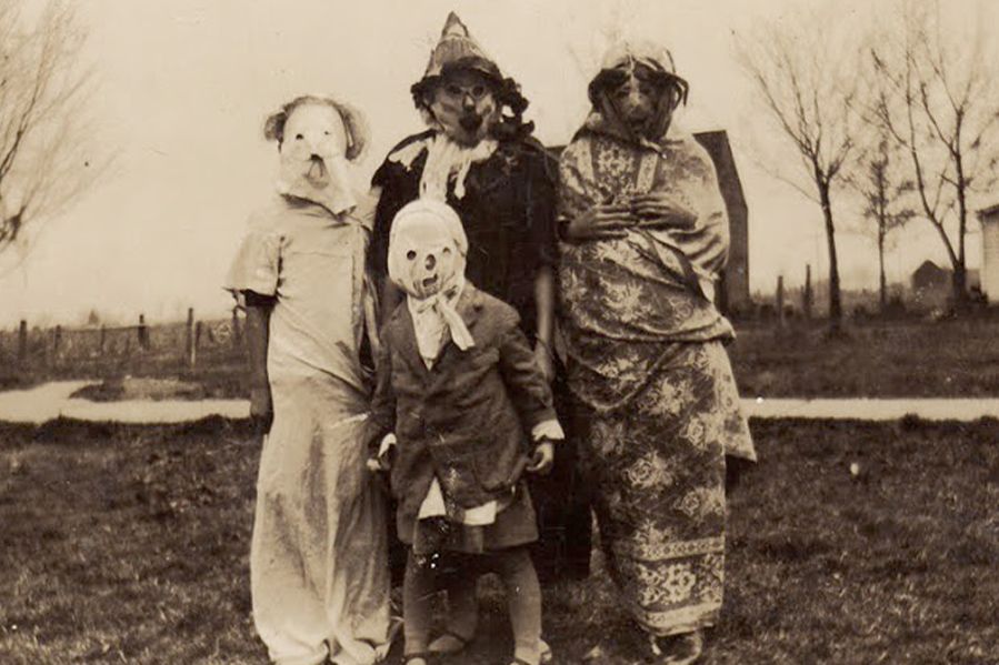 group of children dressed in vintage halloween costumes