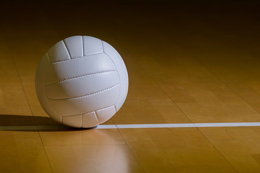 a volleyball on gymnasium floor