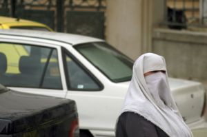 Muslim woman in burqa outdoors