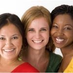 group of three smiling women