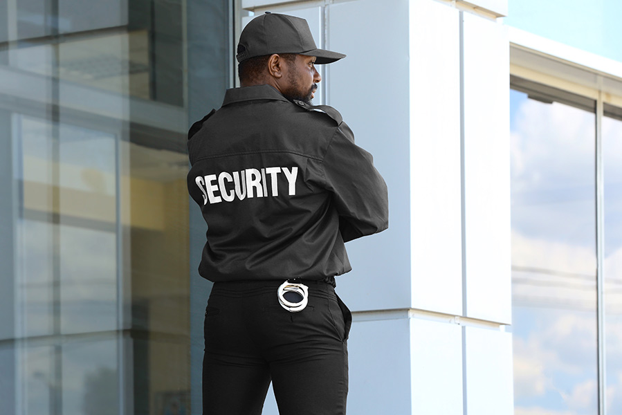 An armed guard protects a church