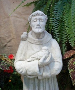 Stone bust of man holding dove