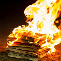 Texas Pastor Burns Book About Atheism, Claims USA is a “Christian Nation”