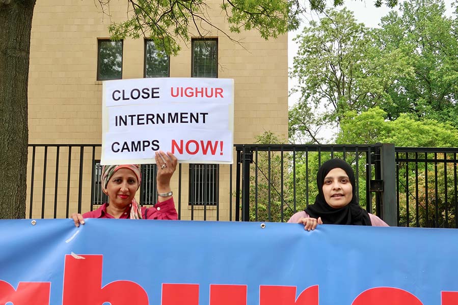 women protest treatment of Uighur Muslims