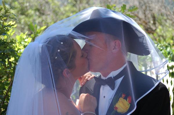 This cowboy wedding is solidified with a kiss.