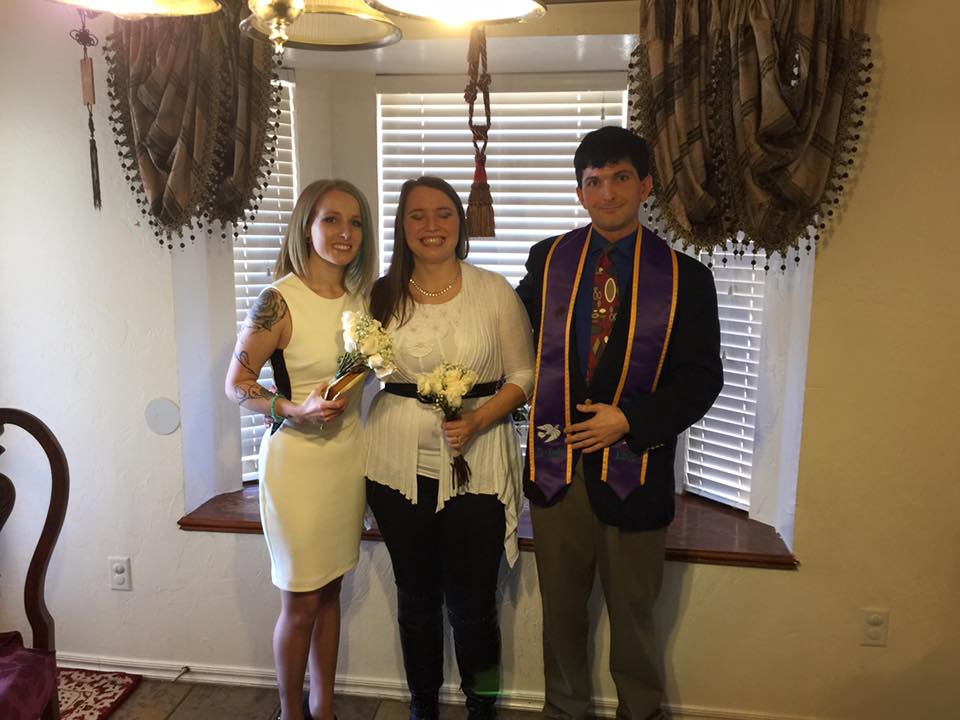 This sweet lesbian couple held their wedding with their beautiful family in attendance at the home of wedding officiant in OKC Dr. John Patrick Keefe II.