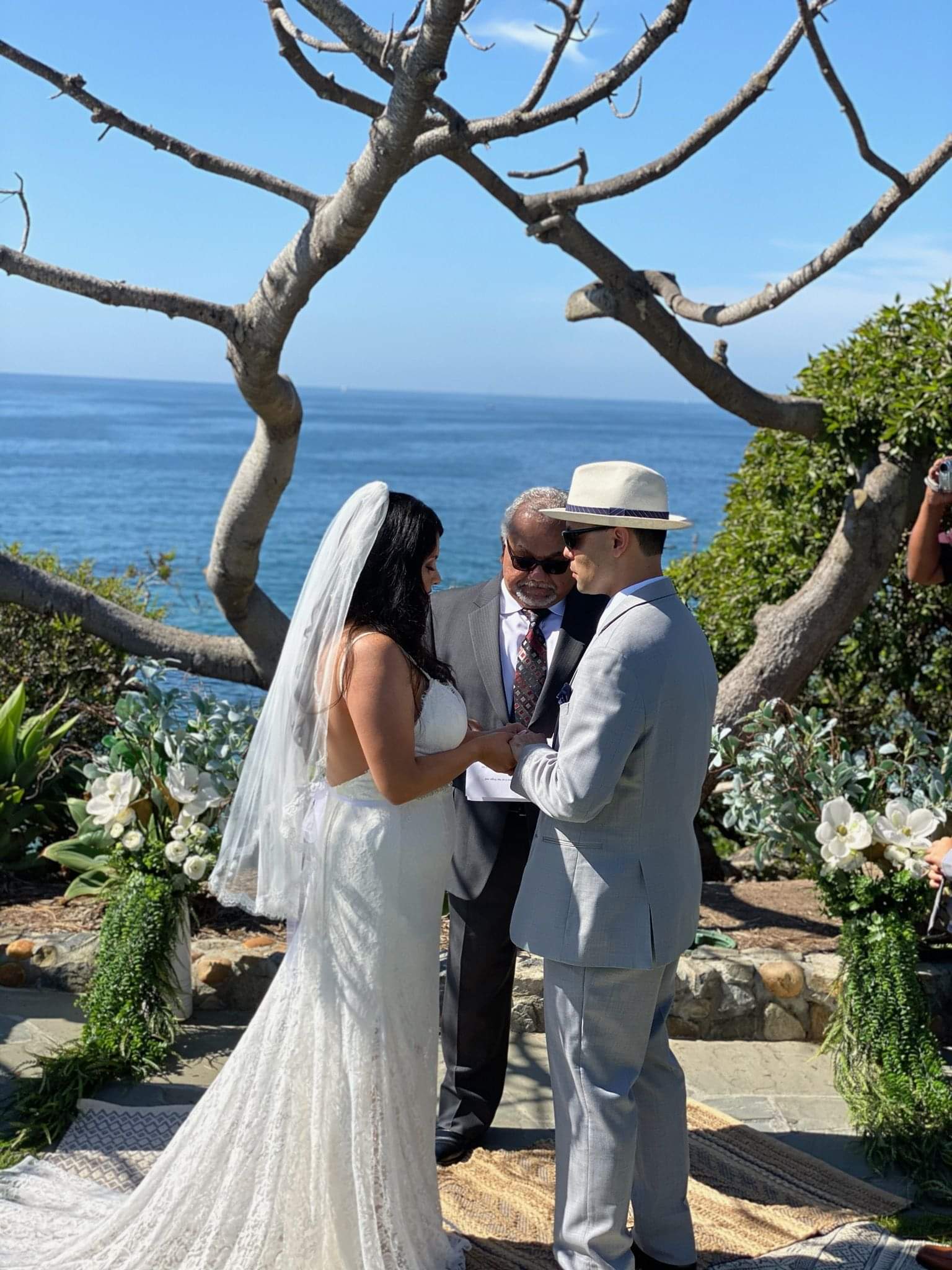 The handsome couple were married in Laguna Beach Ca. The location was at Hiesler Park in Alieso Viejo. The bride selected this location because of the beautiful Seascape which they both enjoy. Absolutely stunning