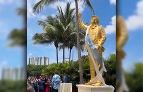 A golden statue of Donald Trump