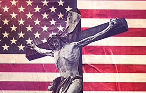 Jesus on the crucifix in front of the American flag