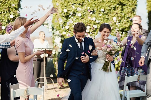 Happy Couple Leaving Wedding