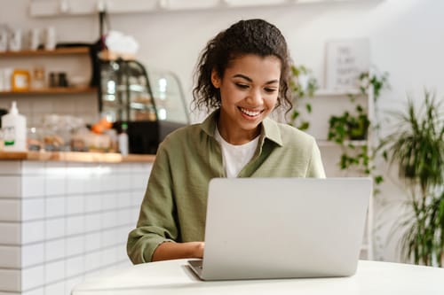 Young woman becoming ordained on computer