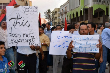 Libyan with sign that says - this does not represent us