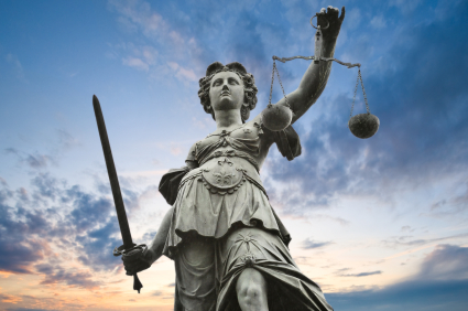 justice statue with sword and scale. cloudy sky in the backgroun statue, justice, scales