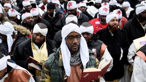 Black Israelites reading the Bible